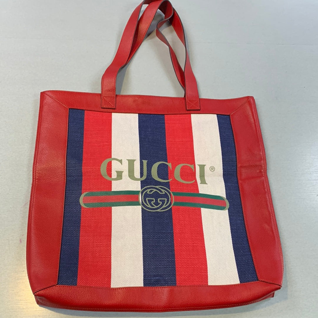 Gucci striped logo canvas tote bag.